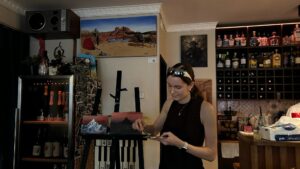 Artist Isabel Silla guiding a painting session during Sip & Paint event at Toro Wine Bar in Tallinn